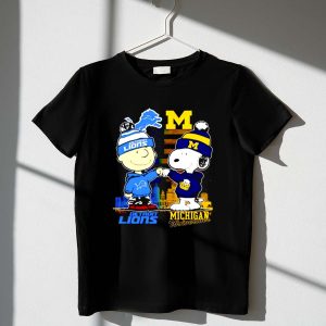 Charlie Brown Detroit Lions vs Snoopy Michigan Wolverines city skyline 1 T Shirt.jpg