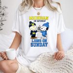 Charlie Brown Michigan Wolverines on Saturday and Snoopy Detroit Lions on Sunday 1 T Shirt.jpg