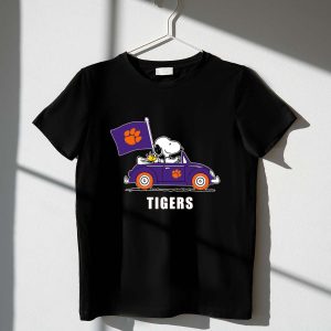 Clemson Tigers Snoopy Driving With Woodstock In Purple Car 1 T Shirt.jpg