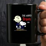 Die Hard Braves Fan Snoopy and Charlie Brown in Team Jerseys 3 mug.jpg