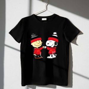 Fist Bump Charlie Brown and Snoopy Wear Clothing Calgary Flames 1 T Shirt.jpg