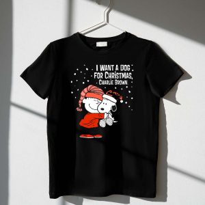 I Want a Dog for Christmas Charlie Brown Snoopy Hugging Linus Snow Scene T Shirt 1 1.jpg