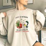 Just A Woman Who Loves Snoopy Hug Woodstock And Christmas 3 Sweatshirt 1.jpg