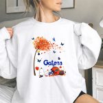 Life Is Better with Florida Gators Snoopy Helmet Football Tree Butterflies 9 Sweatshirt.jpg