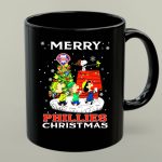 Merry Phillies Christmas Snoopy and Friends by Christmas Tree with Philadelphia Phillies 1 mug.jpg