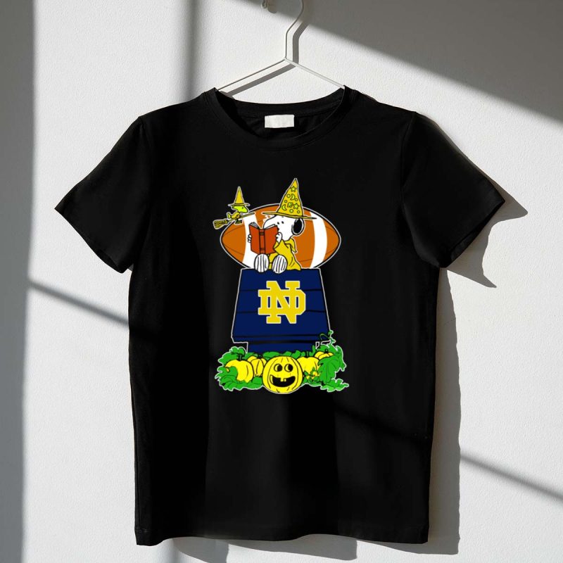 Notre Dame Fighting Irish Snoopy Halloween Pumpkin Scene With Football 1 T Shirt.jpg