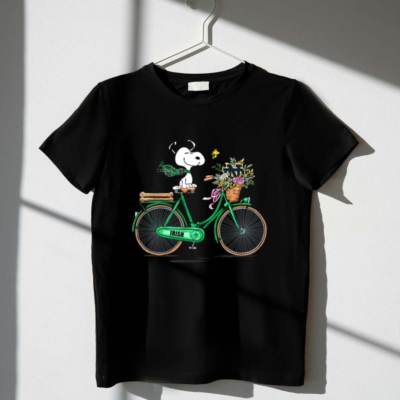 Notre Dame Fighting Irish Snoopy On Bicycle With Flowers And Woodstock 1 T Shirt.jpg