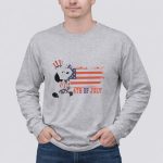 Patriotic Snoopy Wearing Uncle Sam Hat with American Flag Background 4th Of July 6 Long Sleeves