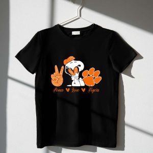 Peace Love Clemson Tigers Snoopy With Paw Print And Heart Icons 1 T Shirt.jpg