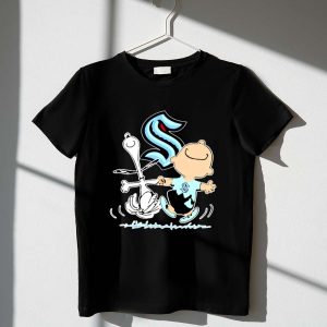 Seattle Kraken Snoopy and Charlie Brown dancing 1 T Shirt.jpg