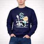 Seattle Kraken Snoopy and Charlie Brown dancing 3 Sweatshirt.jpg