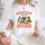 Snoopy and Charlie Brown Christmas Movie Junkie with TV and Gifts 1 T Shirt 1.jpg