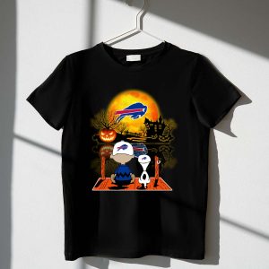Snoopy and Charlie Brown watching Buffalo Bills halloween shirt 1 T Shirt.jpg