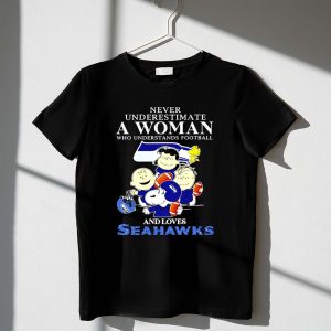 Snoopy and Friends never underestimate a woman who understands Seahawks 1 T Shirt 1.jpg