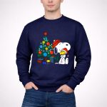 Snoopy and Woodstock Celebrating Christmas by the Tree 3 Sweatshirt 1.jpg