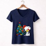 Snoopy and Woodstock Celebrating Christmas by the Tree 5 Womens V Neck 1.jpg