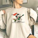 Snoopy and Woodstock Santa Rocking Guitars Tis The Season to Rock 3 Sweatshirt 1.jpg
