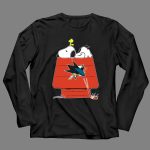 Snoopy and Woodstock on Doghouse with San Jose Sharks Logo and Hockey Sticks 4 Long Sleeves.jpg