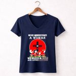 Snoopy never underestimate who believes in Jesus and loves Georgia Bulldogs 5 Womens V Neck.jpg