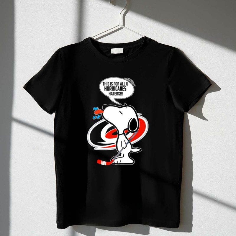 Snoopy With Hockey Stick And Carolina Hurricanes Logo This Is For All U Hurricanes Haters 1 T Shirt.jpg